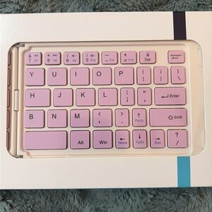 Bluetooth Foldable Pink and White Keyboard